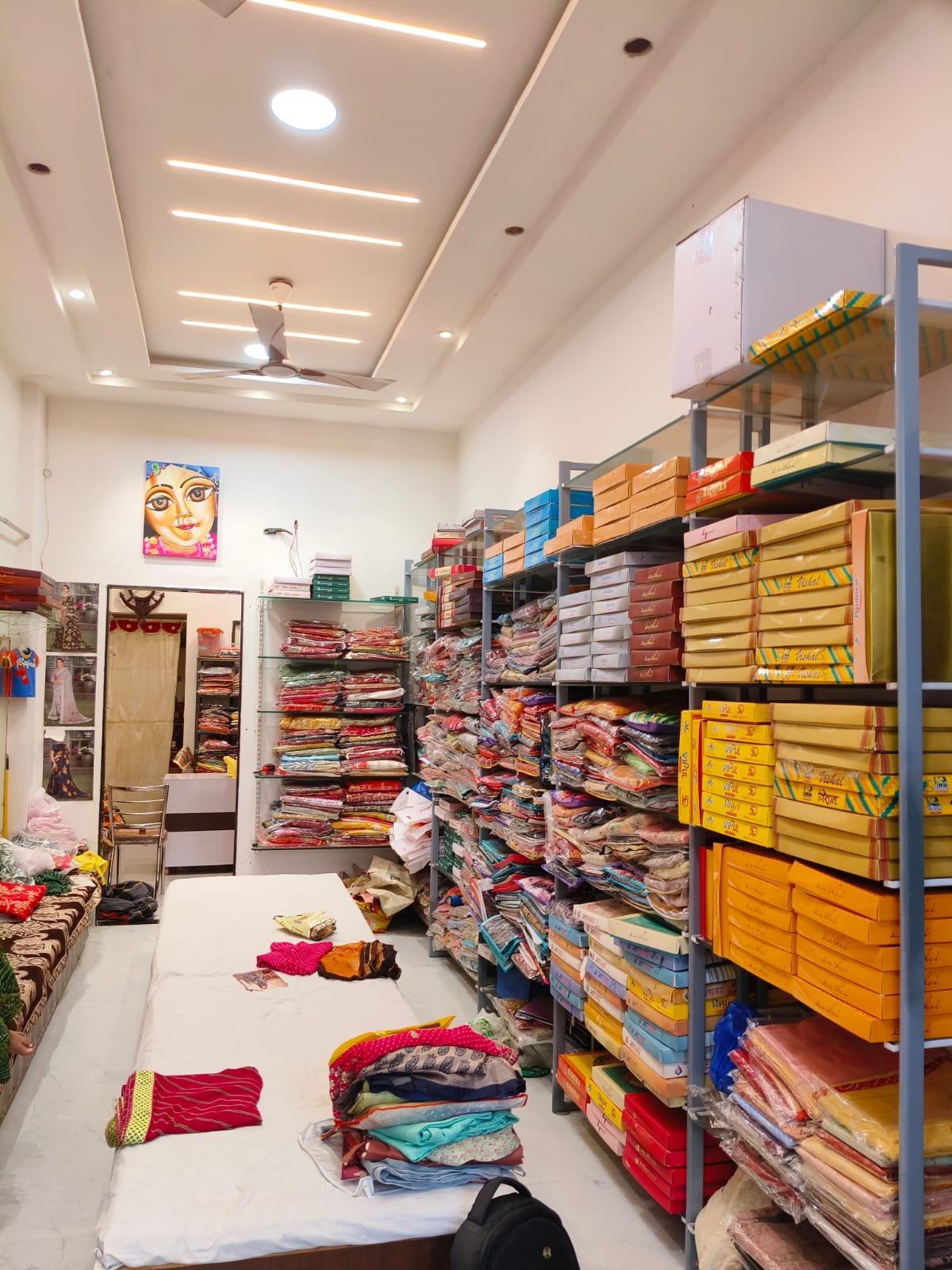 Rimjhim Sarees store interior — saree display shelves
