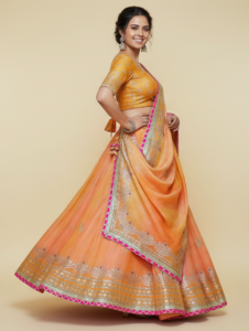 peach–orange dual tone bandhani lehenga choli with mirror work & gota patti border – festive wear